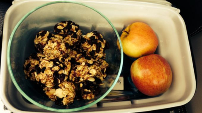 Food tray with bowl of granola and apples