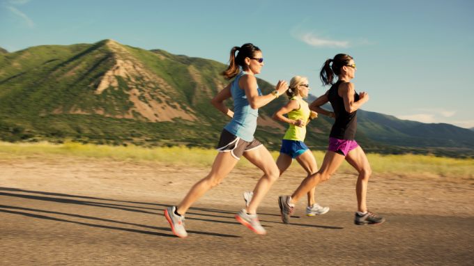 three women running outside